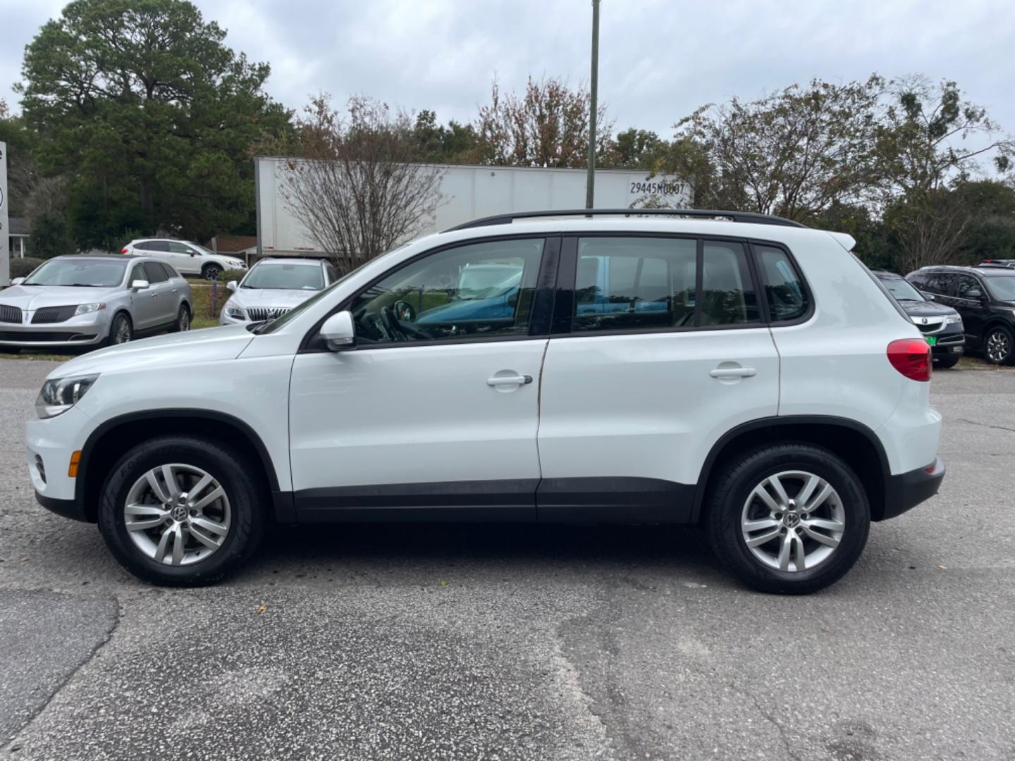 2017 WHITE VOLKSWAGEN TIGUAN S (WVGAV7AX7HK) with an 2.0L engine, Automatic transmission, located at 5103 Dorchester Rd., Charleston, SC, 29418-5607, (843) 767-1122, 36.245171, -115.228050 - Clean Interior with Leather, CD/AUX/USB/Bluetooth, Power Everything (windows, locks, seat, mirrors), Heated Seats, All-weather Mats, Push Button Start, Keyless Entry, Alloy Wheels. Clean CarFax (no accidents reported!) Local Trade-in!! 99k miles Located at New Life Auto Sales! 2023 WINNER for Pos - Photo#3